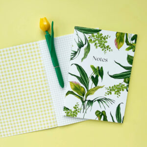 Houseplant notebook and pen open
