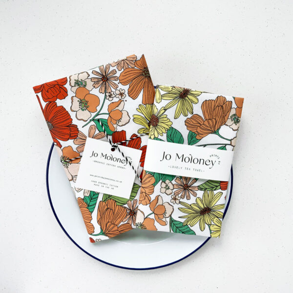 Kitchenware set, peach floral tea towel and matching apron